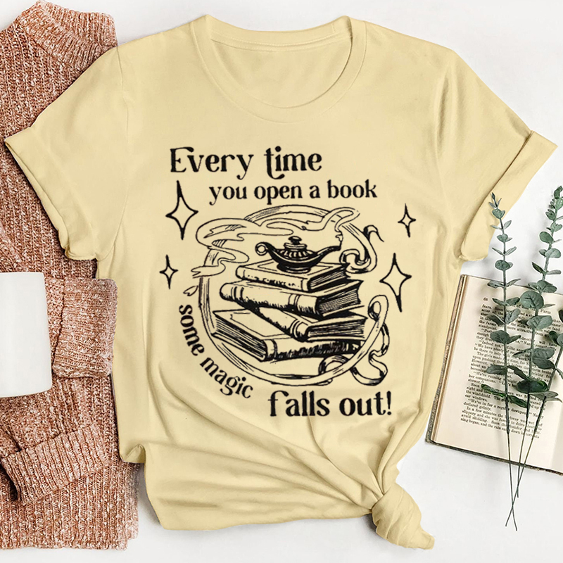 Every Time You Open A Book Some Magic Falls Out Teacher T-Shirt