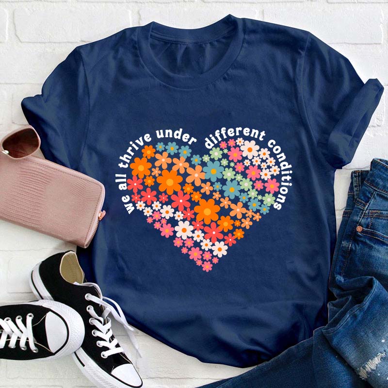 We All Thrive Under Different Conditions Teacher T-Shirt