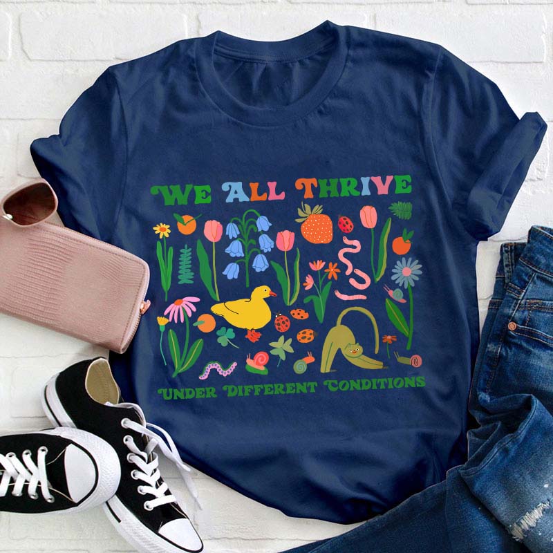 We All Thrive Under Different Conditions Teacher T-Shirt