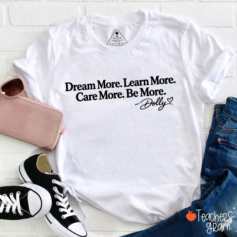Dream More Learn More Care More Be More Dolly Quote Teacher T‑Shirt-Teachersgram