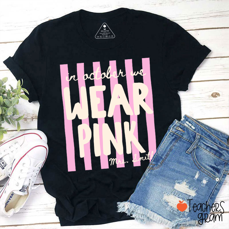 Personalized Name In October We Wear Pink Striped Teacher T-Shirt