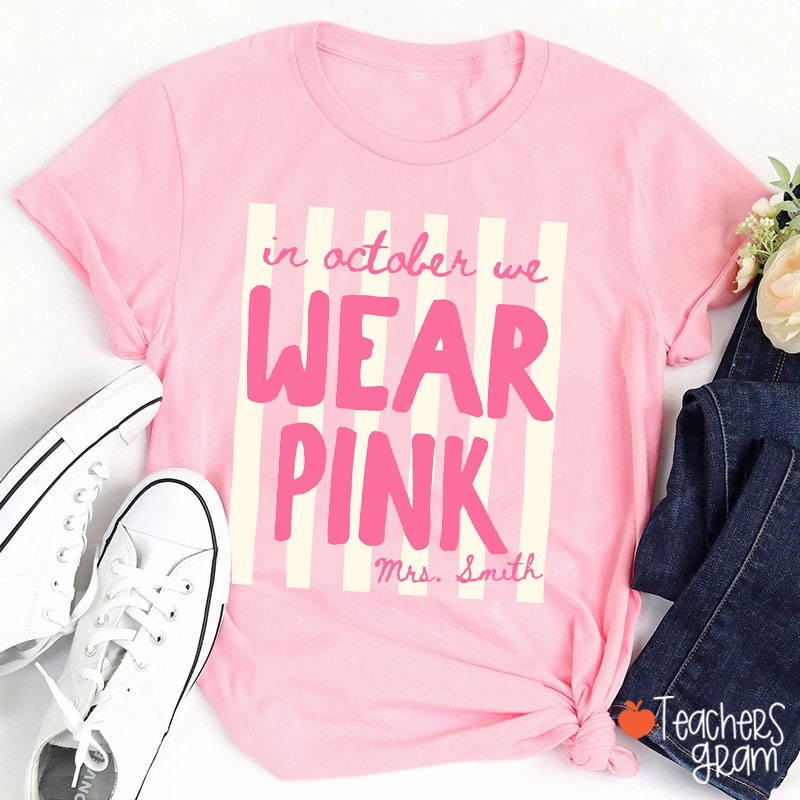 Personalized Name In October We Wear Pink Striped Teacher T-Shirt