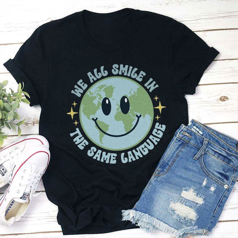 We All Smile In The Same Language Teacher T-Shirt