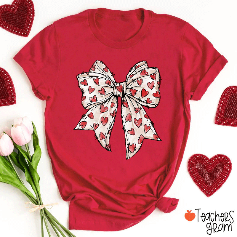 Heart Patterned Bow On Red Background Teacher T-shirt