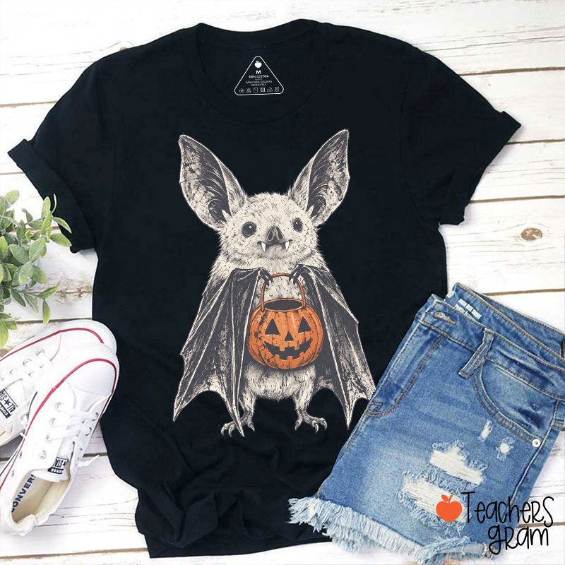 Vintage Bat Holding Pumpkin Bucket Teacher T-Shirt