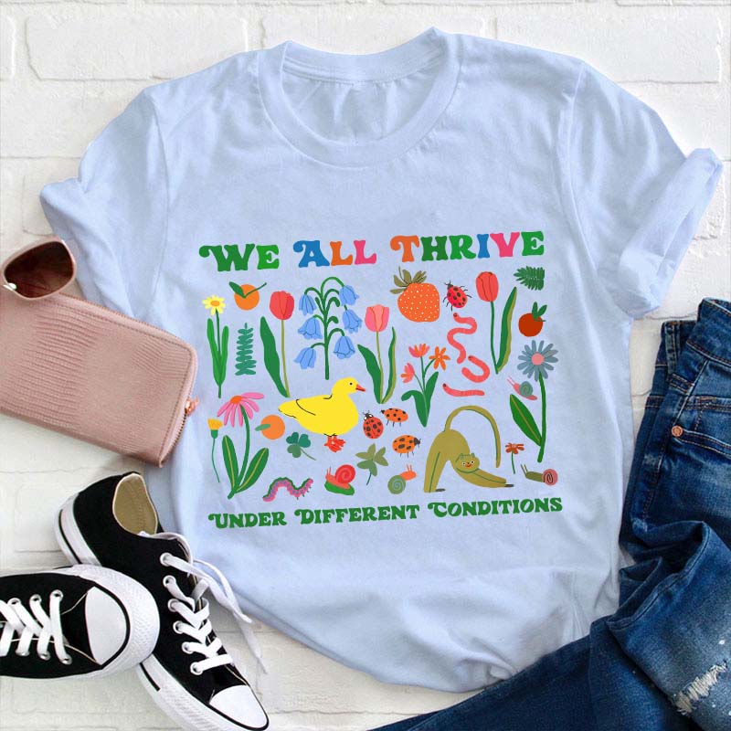 We All Thrive Under Different Conditions Teacher T-Shirt