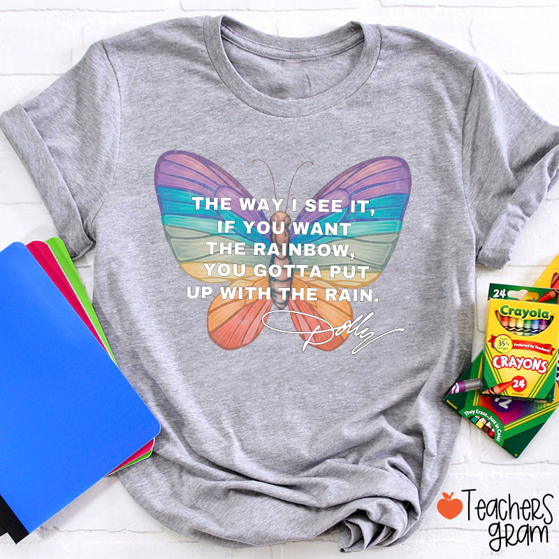 If You Want The Rainbow You Gotta Put Up With The Rain Dolly Teacher T‑Shirt