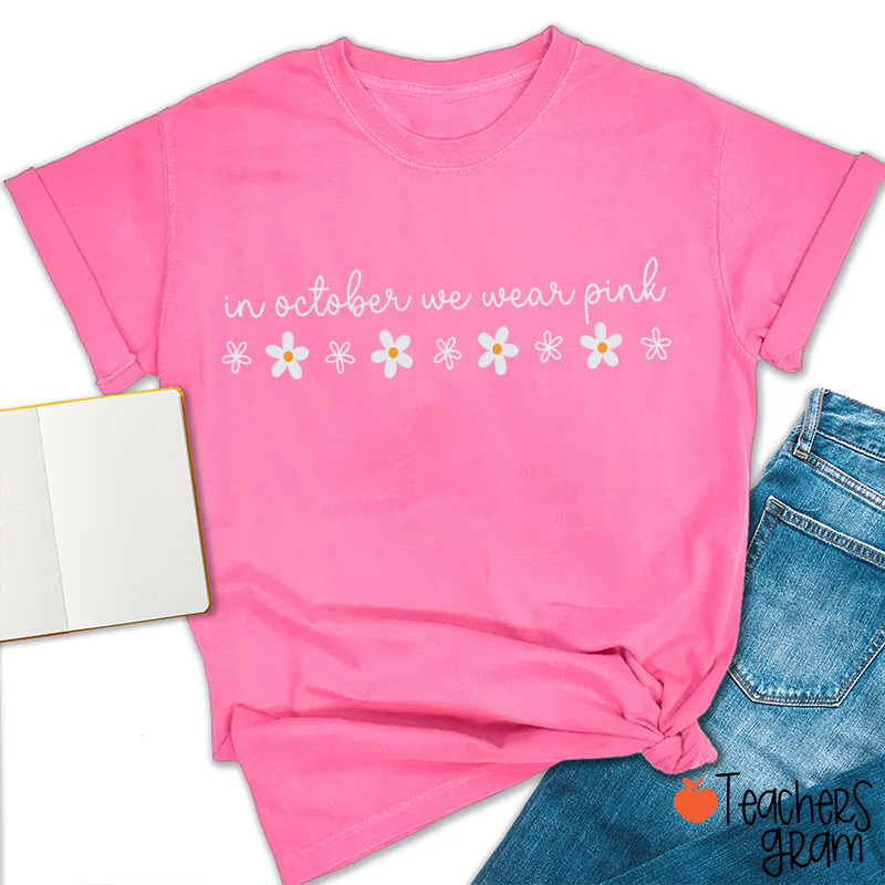 In October We Wear Pink Handwritten Script Daisy Floral Fall Teacher T‑Shirt