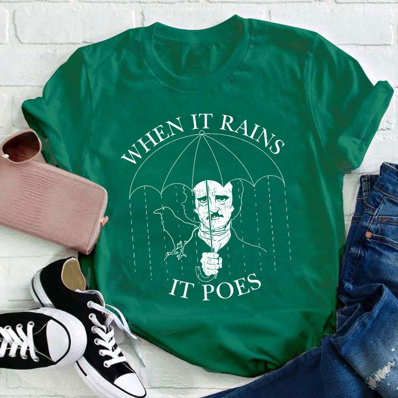 When It Rains It Poes Teacher T-Shirt