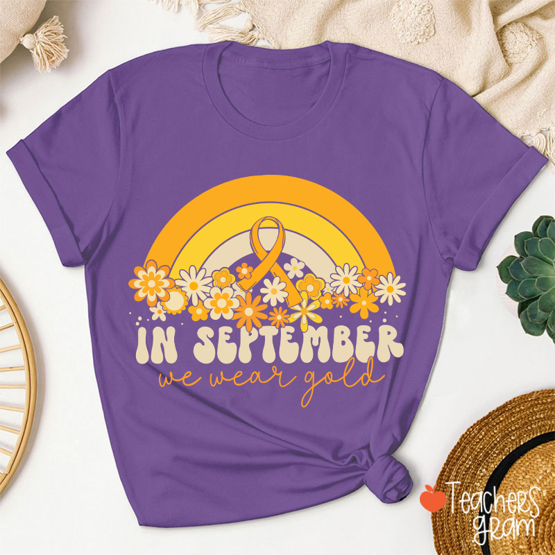 Gold Rainbow In September We Wear Gold Teacher T-Shirt