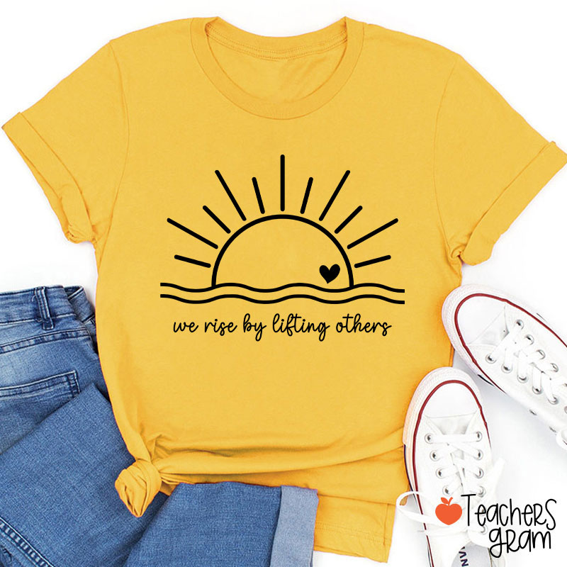 We Rise By Lifting Others Teacher T-Shirt