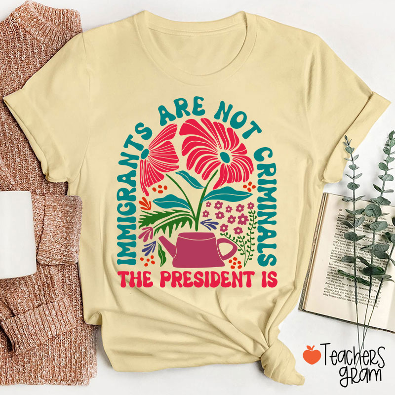 Immigrants Are Not Criminals Teacher T-Shirt