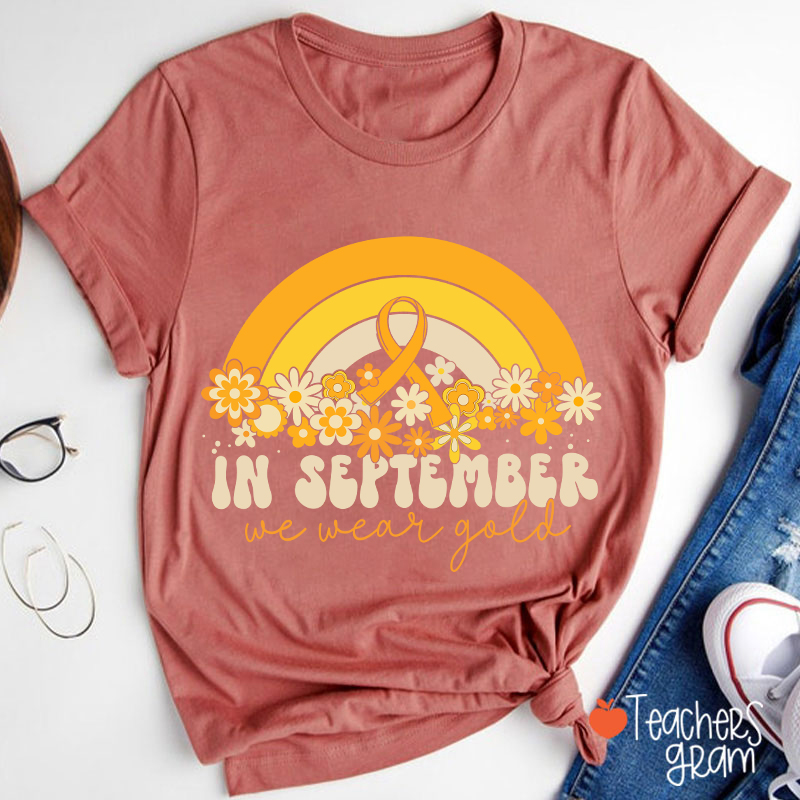 Gold Rainbow In September We Wear Gold Teacher T-Shirt