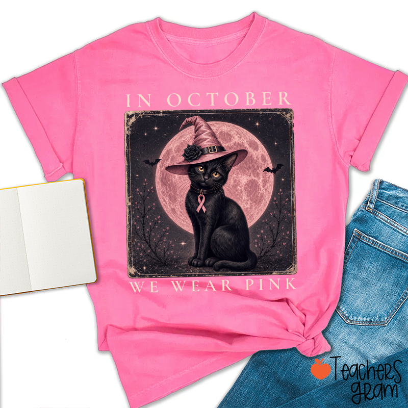 In October We Wear Pink Witch Black Cat Pink Moon Breast Cancer Awareness Teacher T‑Shirt