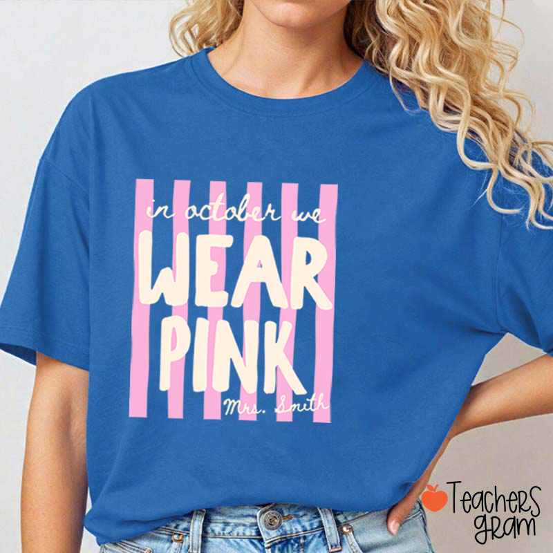 Personalized Name In October We Wear Pink Striped Teacher T-Shirt