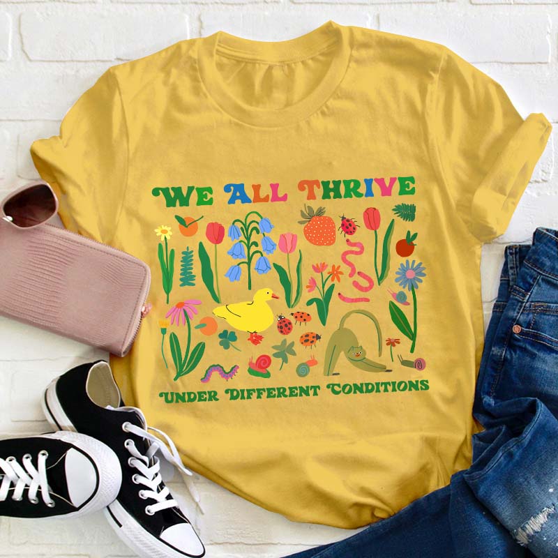 We All Thrive Under Different Conditions Teacher T-Shirt