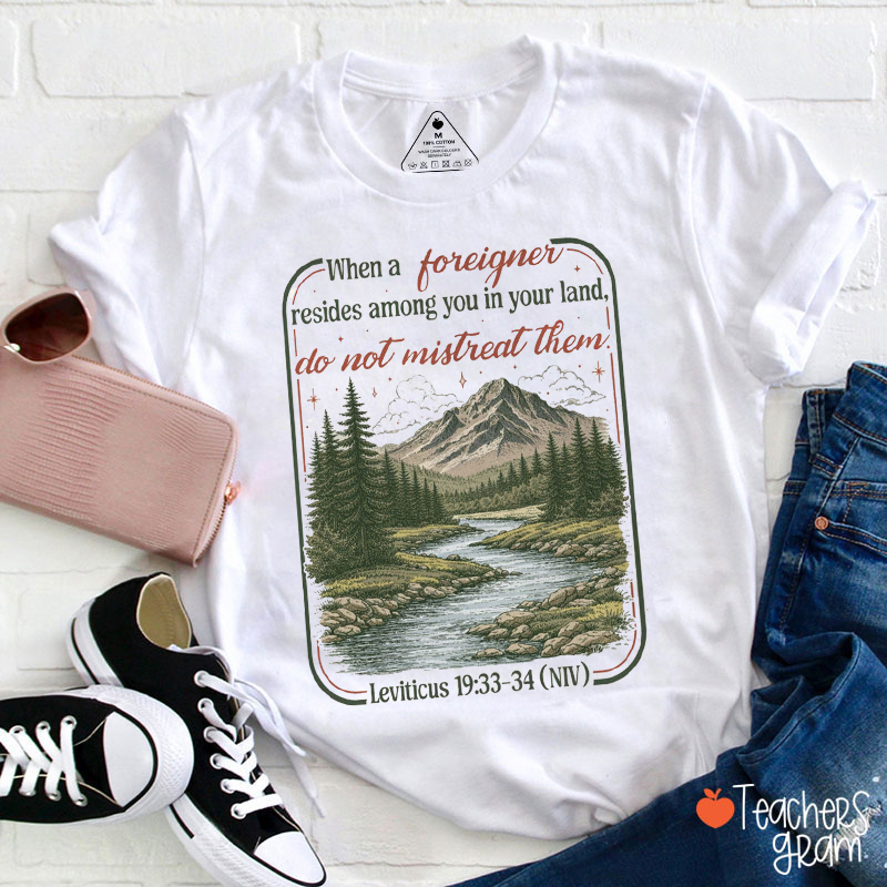 When A Foreigner Resides Among You In Your Land Teacher T-Shirt
