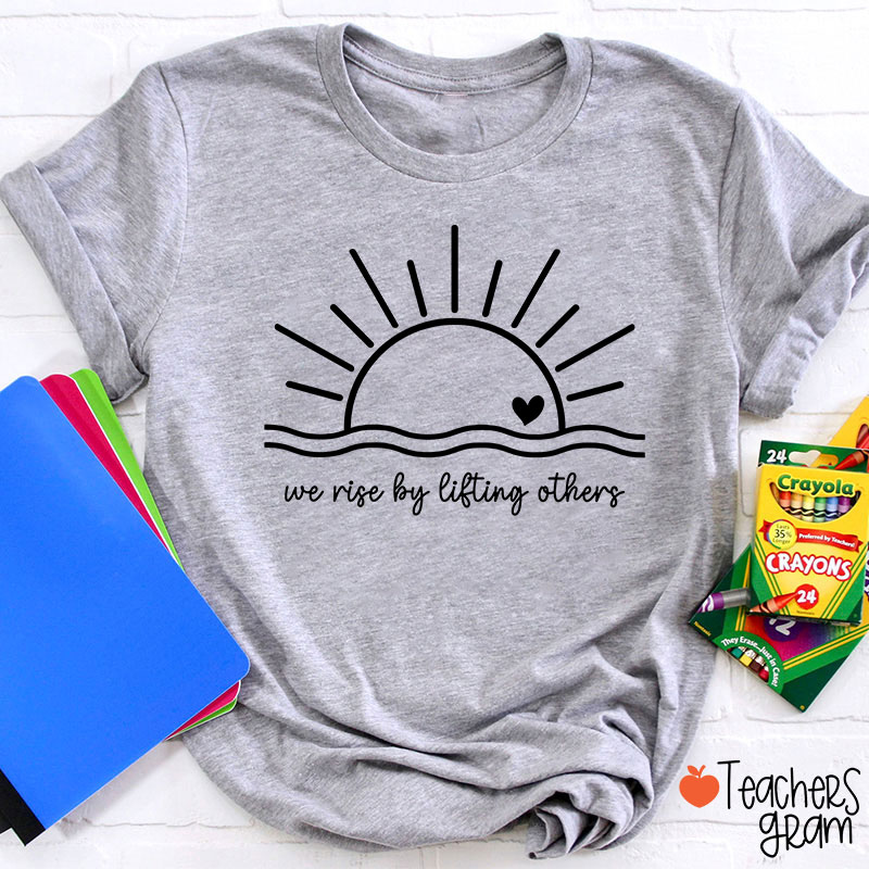 We Rise By Lifting Others Teacher T-Shirt