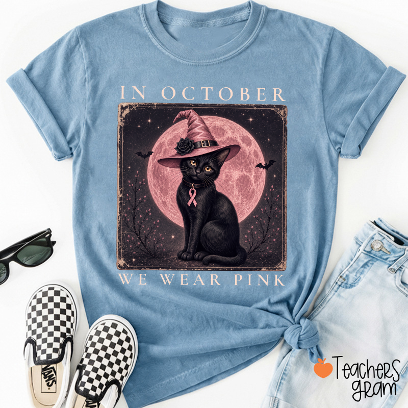 In October We Wear Pink Witch Black Cat Pink Moon Breast Cancer Awareness Teacher T‑Shirt