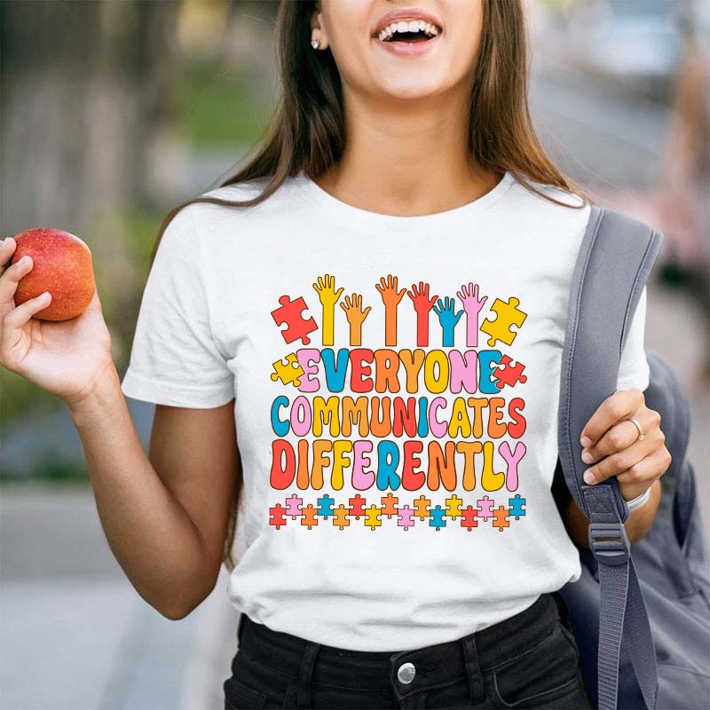 Everyone Communicates Differently Teacher T-Shirt