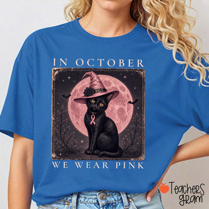In October We Wear Pink Witch Black Cat Pink Moon Breast Cancer Awareness Teacher T‑Shirt