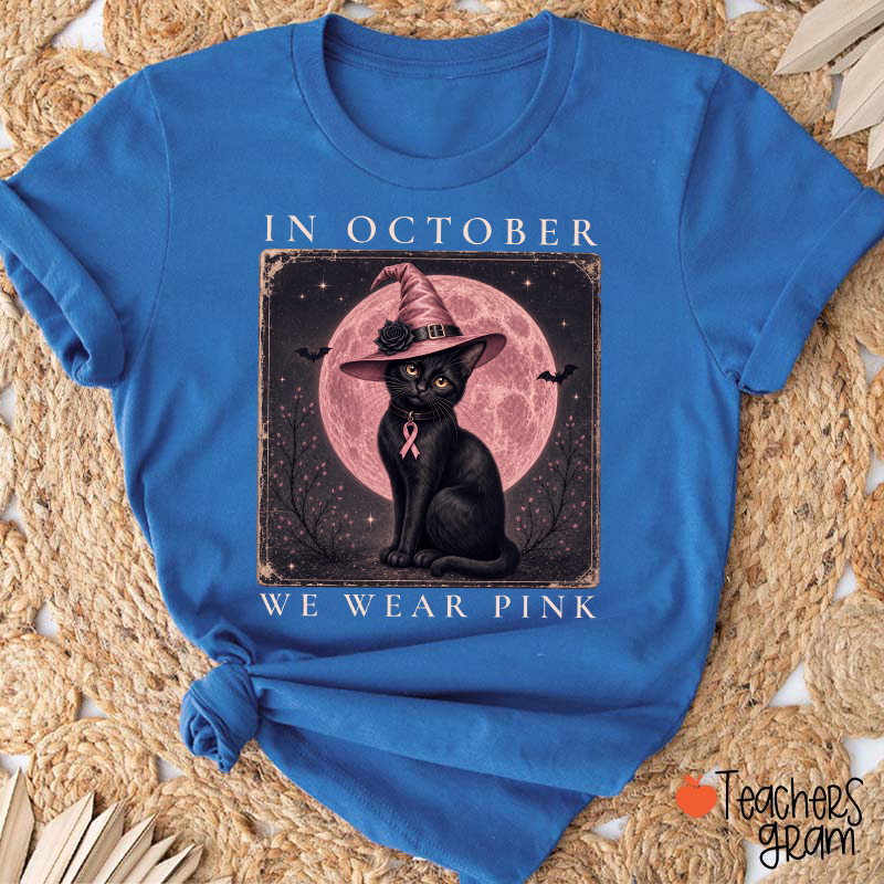 In October We Wear Pink Witch Black Cat Pink Moon Breast Cancer Awareness Teacher T‑Shirt