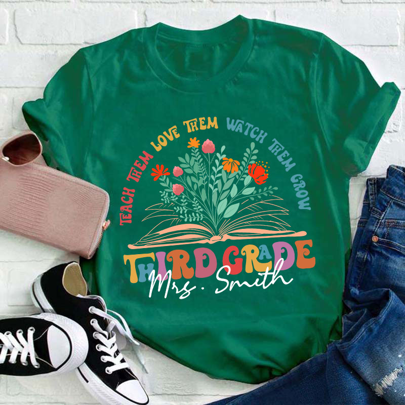 Personalized Book And Flower Teach Them Love Them Watch Them Grow Teacher T-Shirt