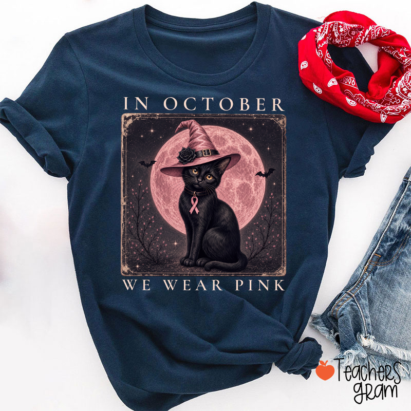 In October We Wear Pink Witch Black Cat Pink Moon Breast Cancer Awareness Teacher T‑Shirt