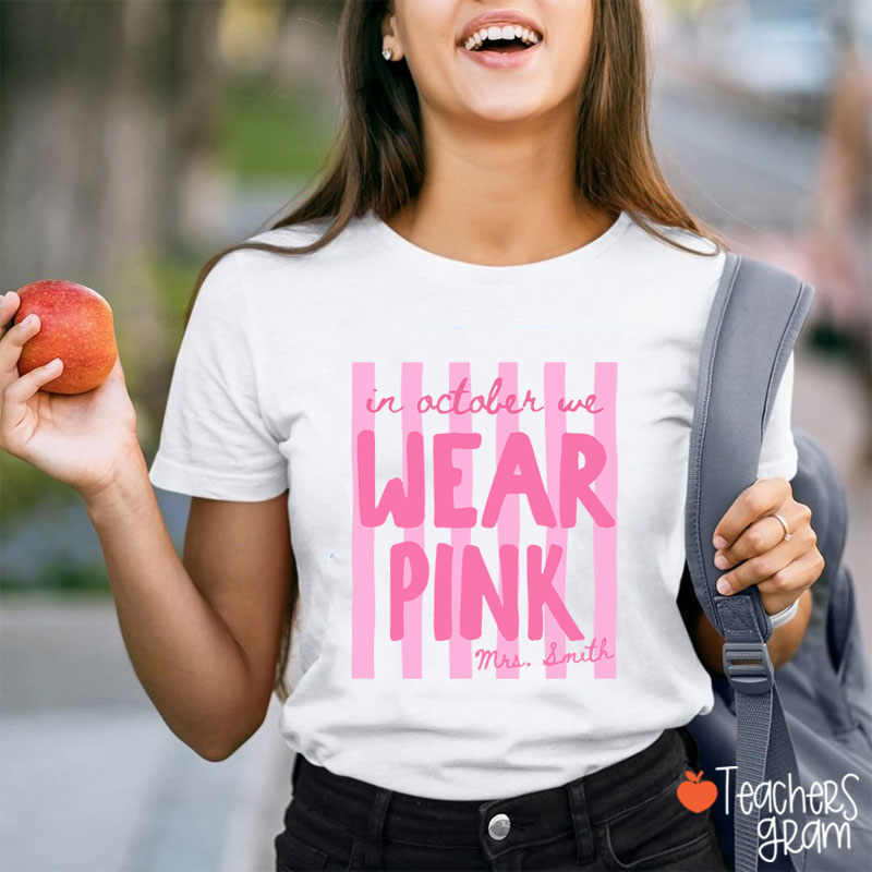 Personalized Name In October We Wear Pink Striped Teacher T-Shirt