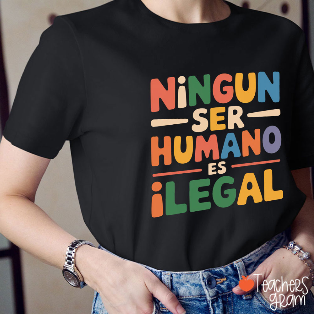 Ningun Ser Humano Es Ilegal Teacher T-Shirt