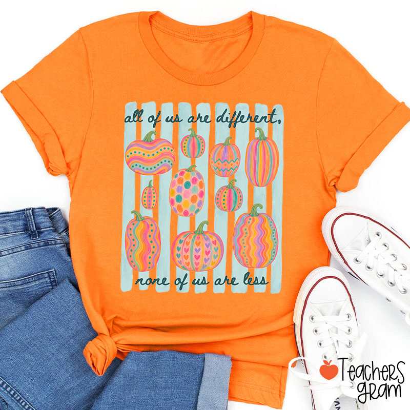 All Of Us Are Different None Of Us Are Less Colorful Pumpkin Teacher T‑Shirt