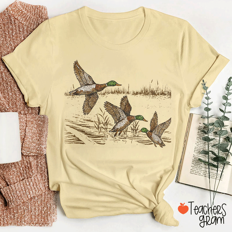 Ducks In Flight Over Wetlands Teacher T-shirt