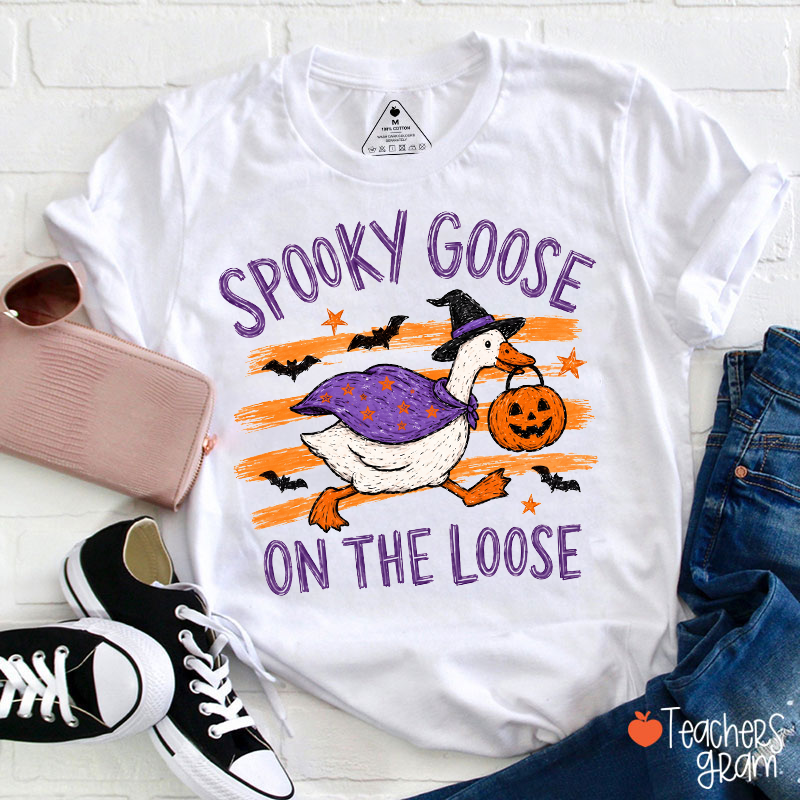 Spooky Goose Cartoon Graphic Halloween Striped Background Teacher T‑Shirt
