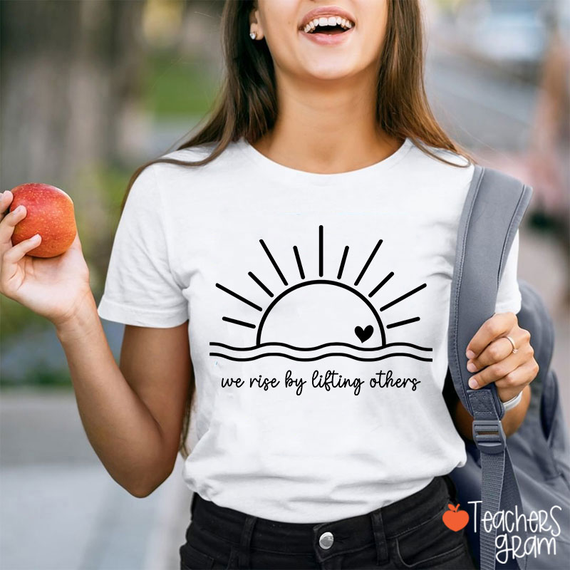 We Rise By Lifting Others Teacher T-Shirt