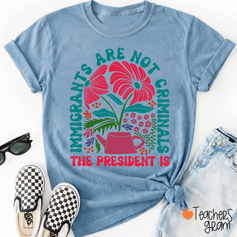 Immigrants Are Not Criminals Teacher T-Shirt