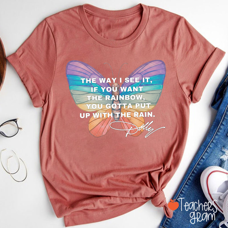 If You Want The Rainbow You Gotta Put Up With The Rain Dolly Teacher T‑Shirt