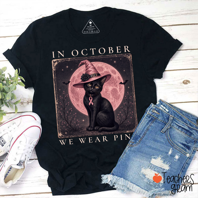 In October We Wear Pink Witch Black Cat Pink Moon Breast Cancer Awareness Teacher T‑Shirt