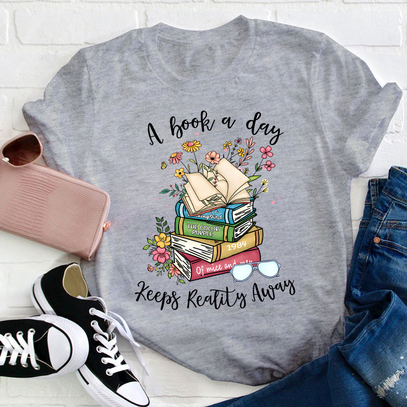 A Book A Day Keeps Reality Away Teacher T-Shirt