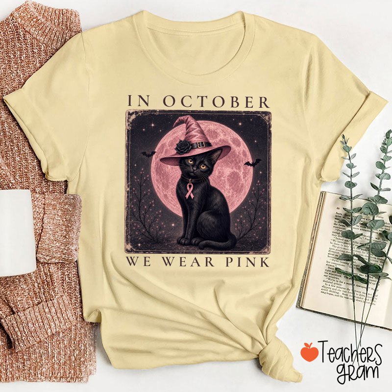 In October We Wear Pink Witch Black Cat Pink Moon Breast Cancer Awareness Teacher T‑Shirt