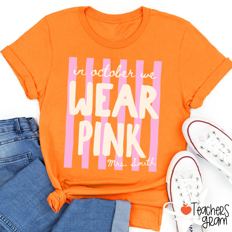 Personalized Name In October We Wear Pink Striped Teacher T-Shirt