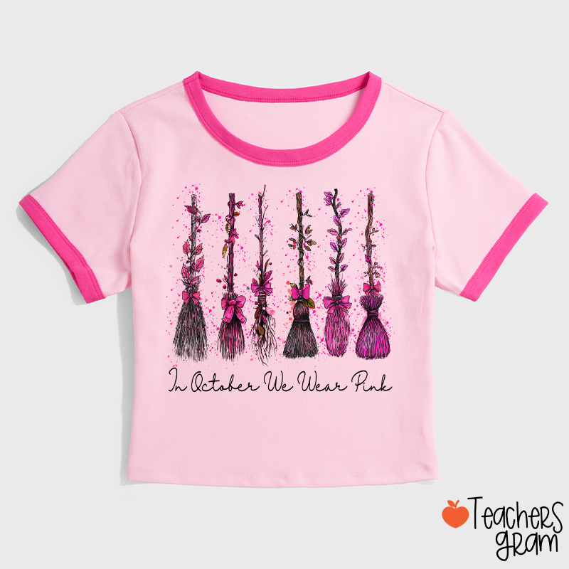 On Wednesday We Wear Pink Witch Broom Teacher Ringer T-Shirt