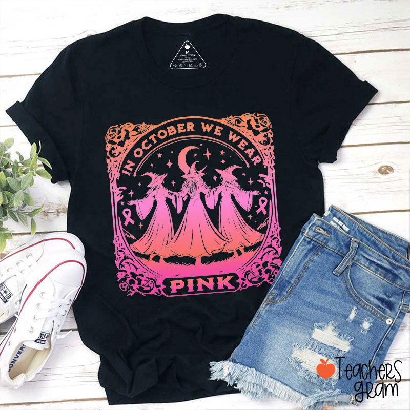 In October We Wear Pink Witch Ribbon Teacher T‑Shirt