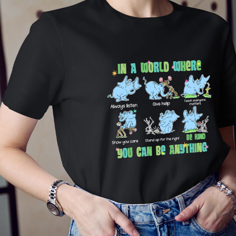 In A World Where You Can Be Anything Be Kind Show You Care Teacher T-Shirt