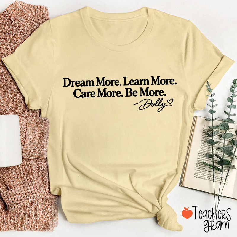 Dream More Learn More Care More Be More Dolly Quote Teacher T‑Shirt