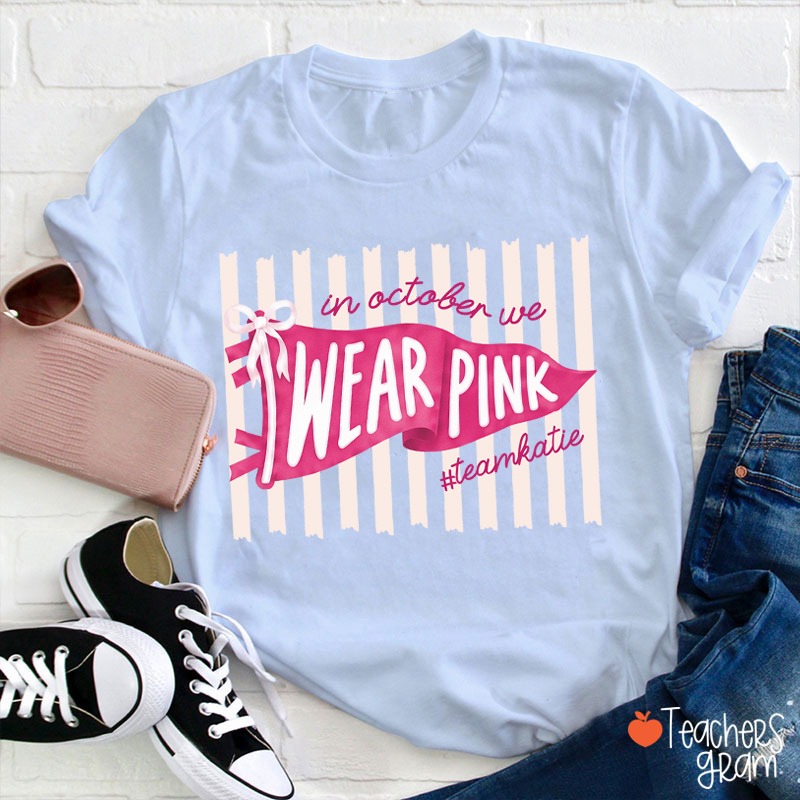 Personalized In October We Wear Pink Pink Stripe Flag Bow Teacher T-Shirt