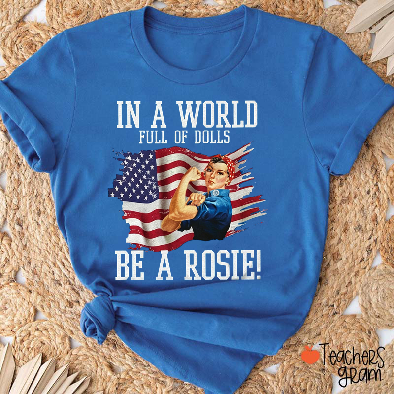 In A World Full Of Dolls Be A Rosie Teacher T-Shirt