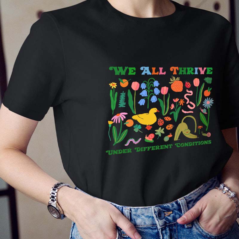 We All Thrive Under Different Conditions Teacher T-Shirt