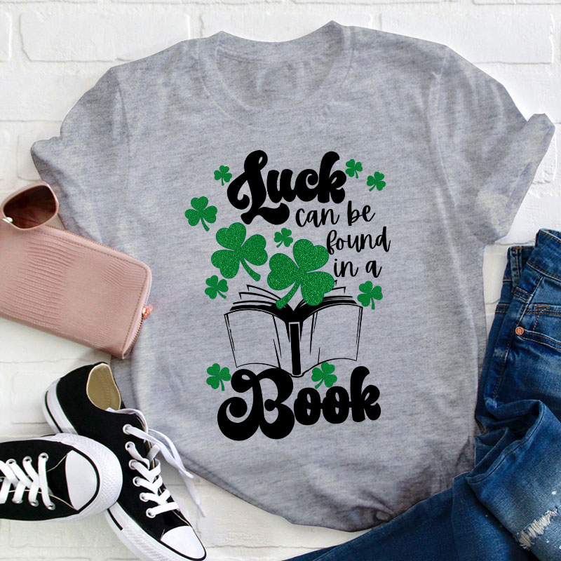 Luck Can Be Found In A Books Teacher T-Shirt