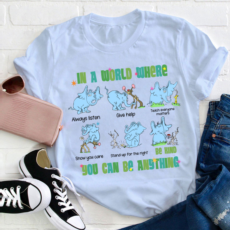 In A World Where You Can Be Anything Be Kind Show You Care Teacher T-Shirt