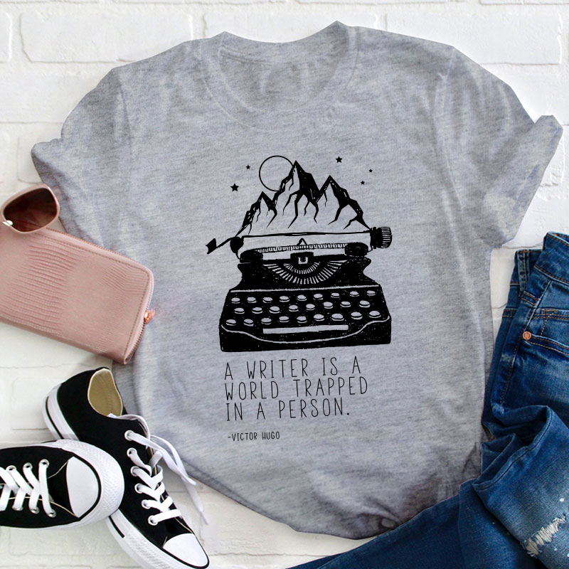 A Writer Is A World Trapped In A Person Teacher T-Shirt